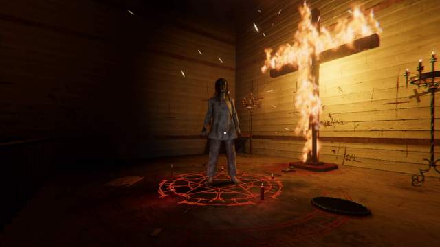 ghost in front of flaming cross in phasmophobia